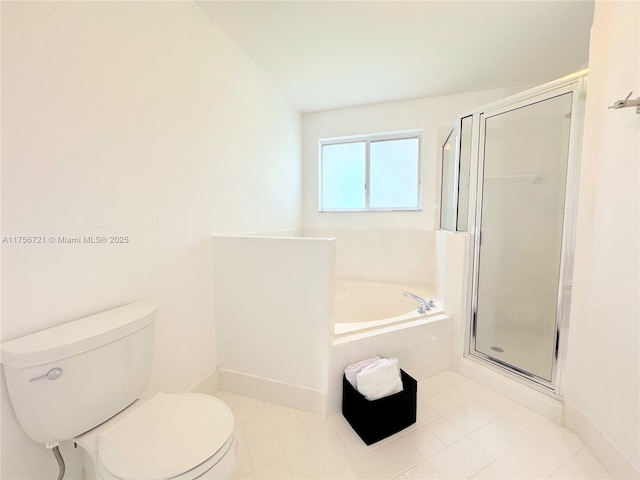 full bath featuring a garden tub, a shower stall, and toilet