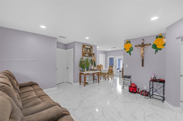 living area with marble finish floor, visible vents, baseboards, and recessed lighting