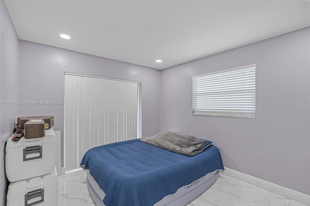 bedroom with marble finish floor, baseboards, and recessed lighting