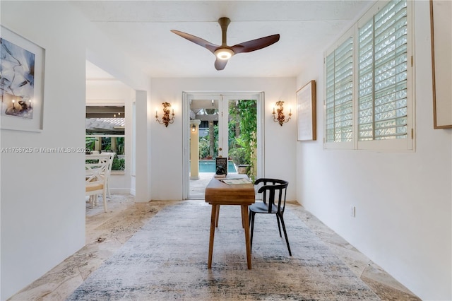 interior space featuring ceiling fan