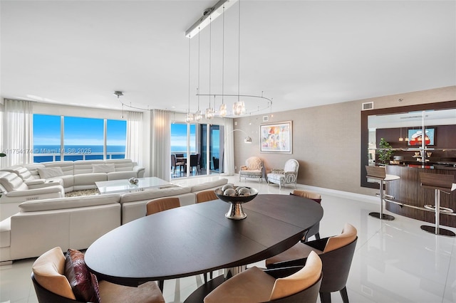 dining area featuring visible vents and baseboards