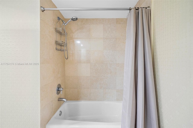 full bathroom featuring shower / bath combo with shower curtain