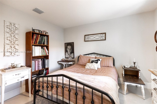 bedroom featuring visible vents