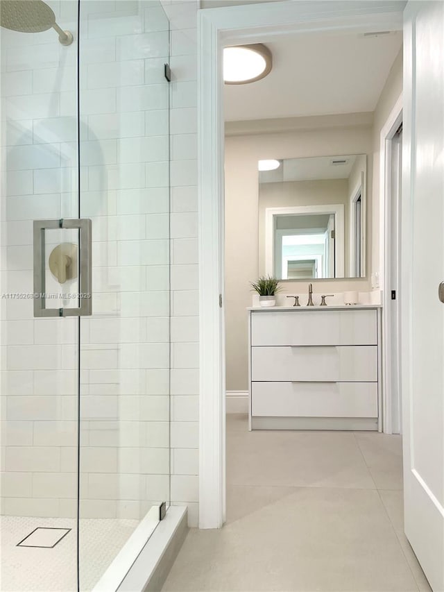 8513 SW 169th Ter, Palmetto Bay, FL 33157 - bathroom with tile patterned flooring, a walk in shower, and vanity