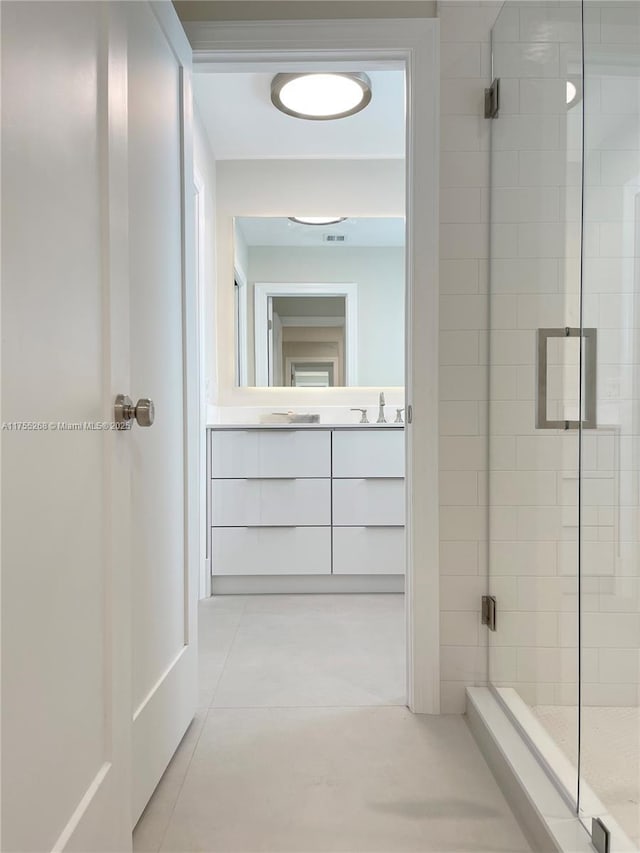 8513 SW 169th Ter, Palmetto Bay, FL 33157 - full bathroom featuring tile patterned flooring, visible vents, vanity, and a stall shower