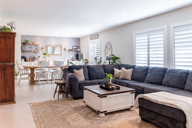 living room featuring light tile patterned floors