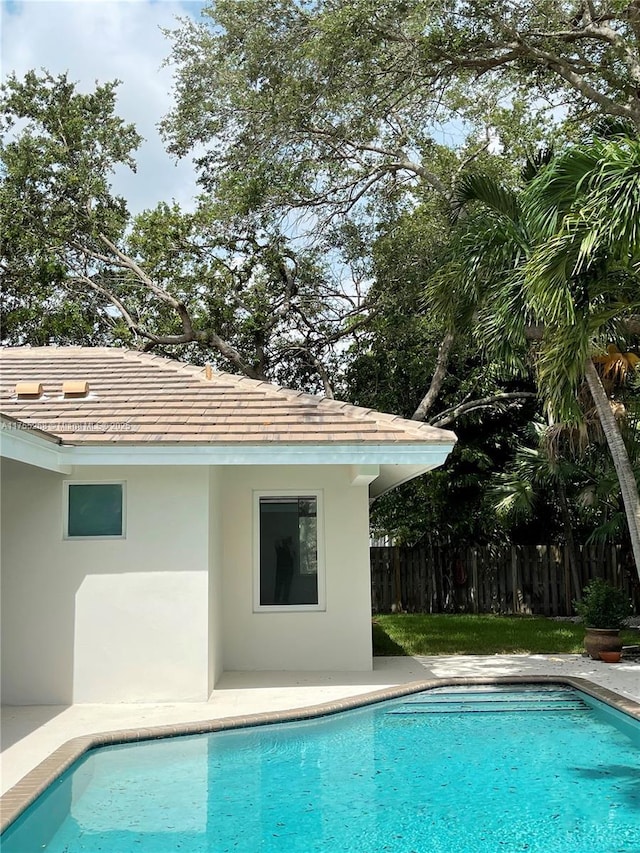 8513 SW 169th Ter, Palmetto Bay, FL 33157 - view of pool featuring a storage structure, a fenced in pool, an outbuilding, and fence