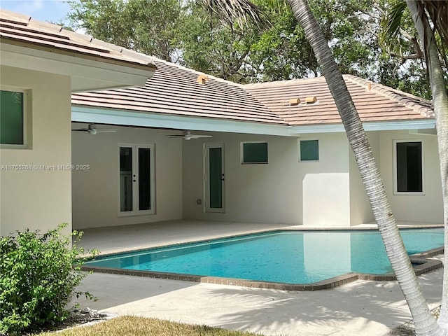 8513 SW 169th Ter, Palmetto Bay, FL 33157 - rear view of property featuring a patio area, stucco siding, and a tile roof