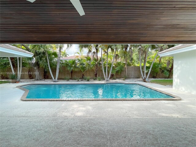 8513 SW 169th Ter, Palmetto Bay, FL 33157 - view of pool featuring a fenced in pool, a fenced backyard, and a patio area