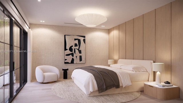 bedroom featuring access to outside, recessed lighting, and wood finished floors