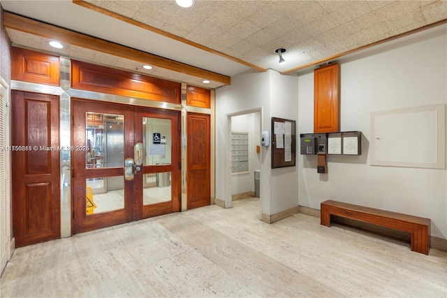 interior space featuring light wood-type flooring, french doors, baseboards, and recessed lighting