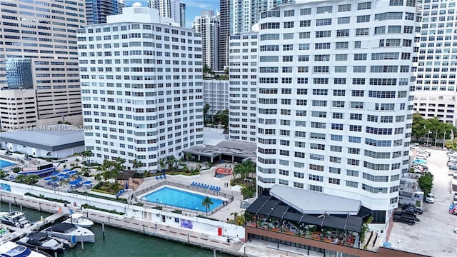 aerial view featuring a water view and a city view