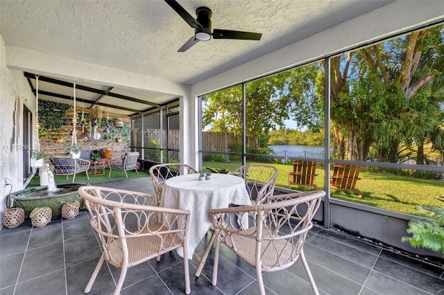 9705 SW 57th St, Cooper City, FL 33328 - sunroom featuring a water view, a ceiling fan, and outdoor dining space