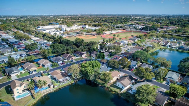 9705 SW 57th St, Cooper City, FL 33328 - bird's eye view featuring a water view and a residential view