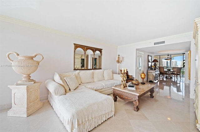 living area featuring visible vents and ornamental molding