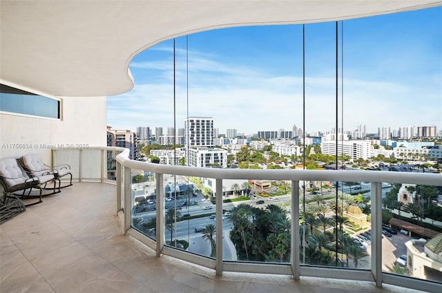 balcony featuring a view of city