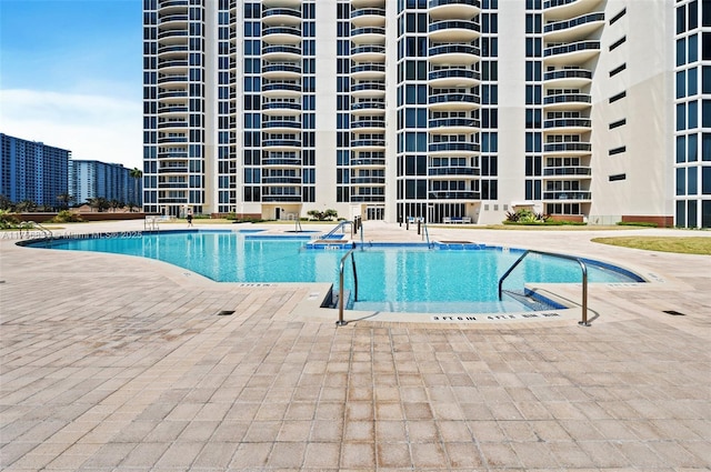 community pool featuring a patio