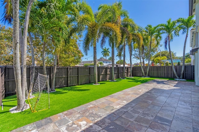 15509 SW 139th Ct, Miami, FL 33177 - fenced backyard featuring a patio