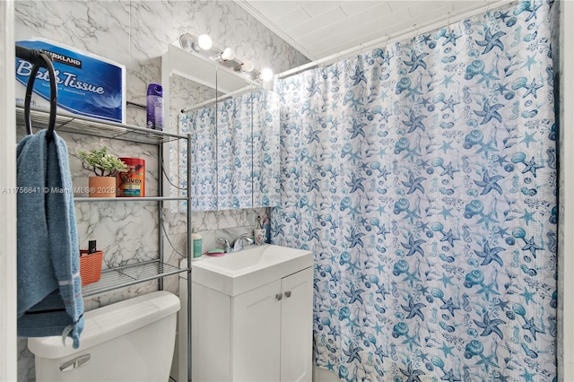 bathroom featuring crown molding, toilet, vanity, and a shower with curtain