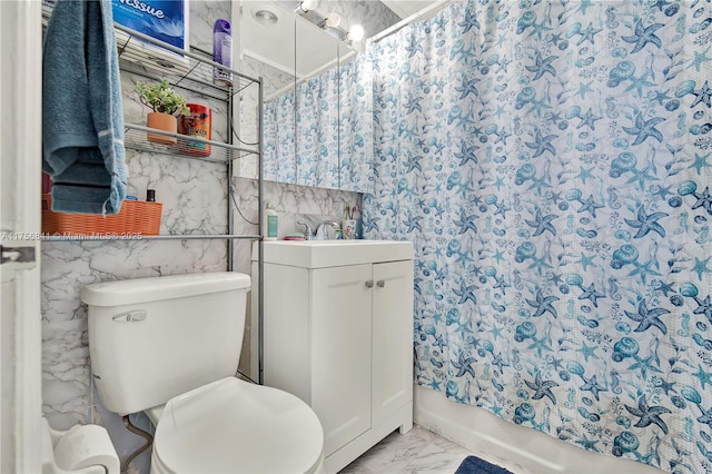 full bath with vanity, toilet, shower / bath combo, and marble finish floor