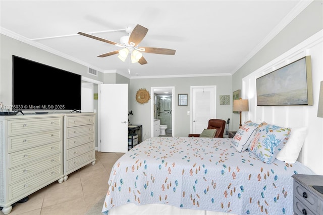 bedroom with visible vents, a ceiling fan, ensuite bath, crown molding, and light tile patterned flooring