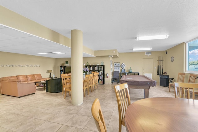 dining space featuring light tile patterned floors, visible vents, and pool table