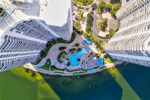 birds eye view of property featuring a water view