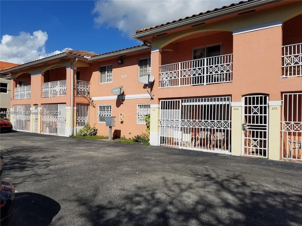 view of property with fence