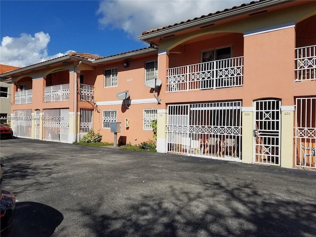 view of property with fence