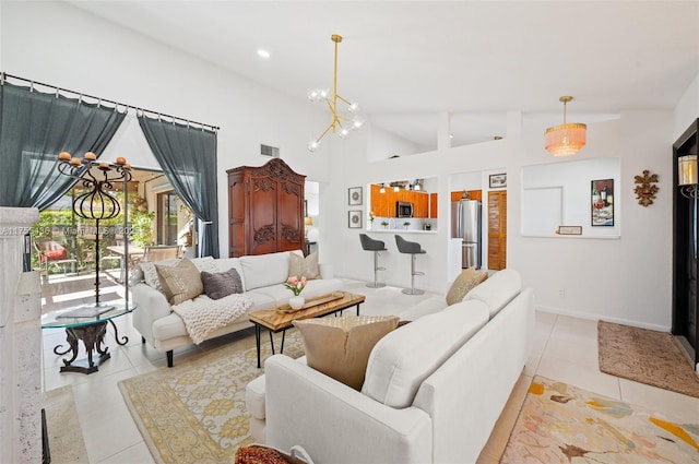 living room featuring lofted ceiling, light tile patterned floors, baseboards, and visible vents