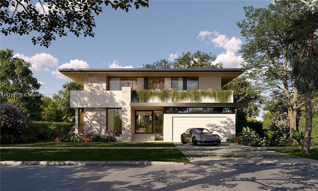 view of front facade featuring a front lawn, decorative driveway, an attached garage, and stucco siding