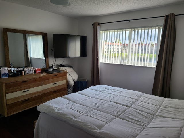 bedroom featuring a textured ceiling