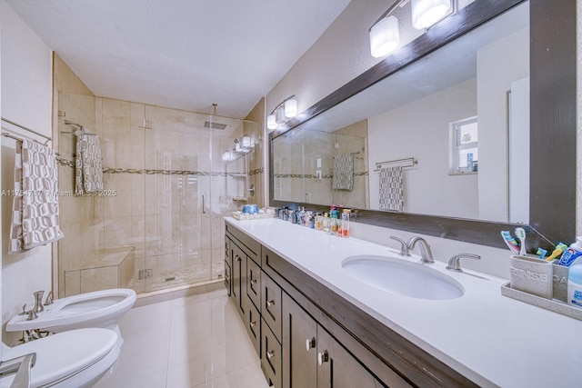 bathroom featuring double vanity, a stall shower, toilet, a bidet, and a sink