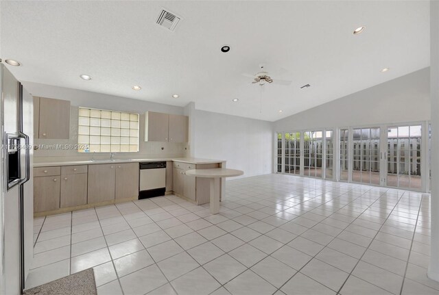9820 SW 154th Pl, Miami, FL 33196 - kitchen featuring visible vents, a sink, open floor plan, a peninsula, and dishwasher