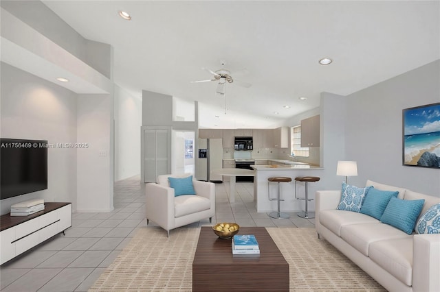 living room featuring recessed lighting, ceiling fan, and light tile patterned flooring