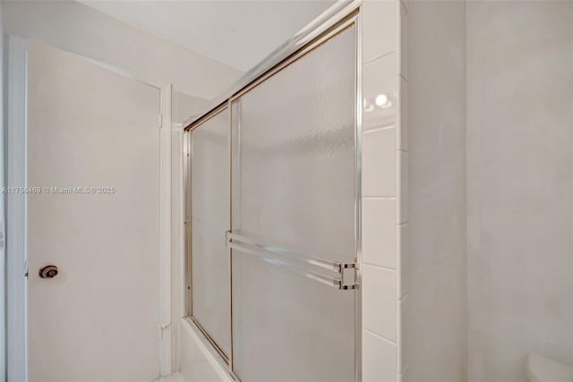 9820 SW 154th Pl, Miami, FL 33196 - bathroom with enclosed tub / shower combo and toilet