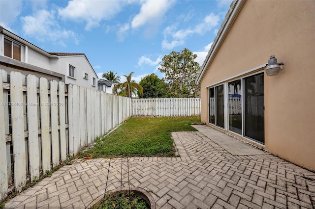 view of patio with a fenced backyard