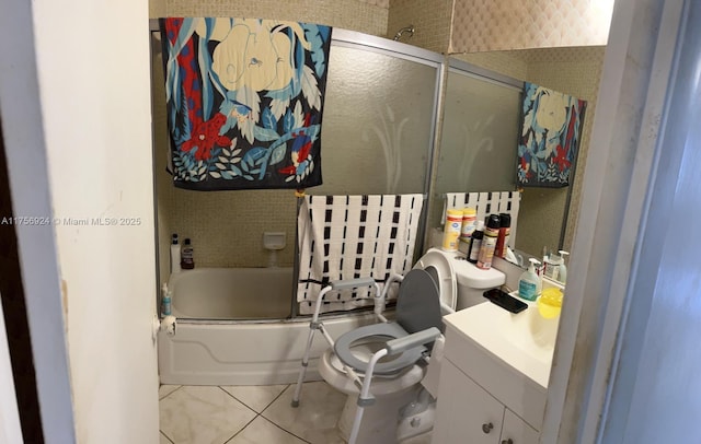 full bath with bath / shower combo with glass door, vanity, and tile patterned floors