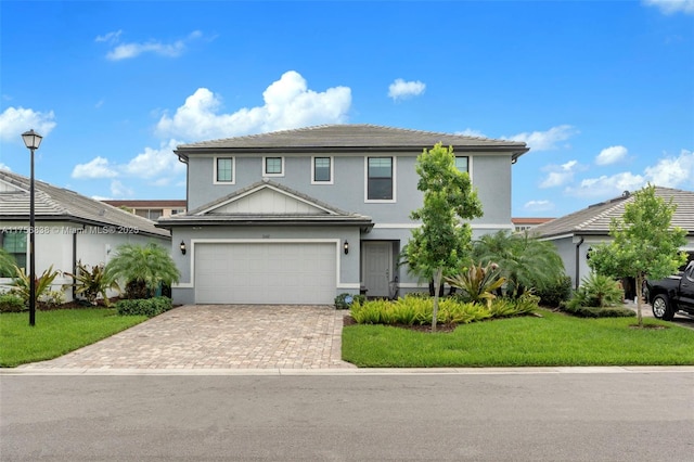 3142 Poinciana St, Lauderdale Lakes, FL 33311 - traditional-style house with stucco siding, decorative driveway, and a front yard