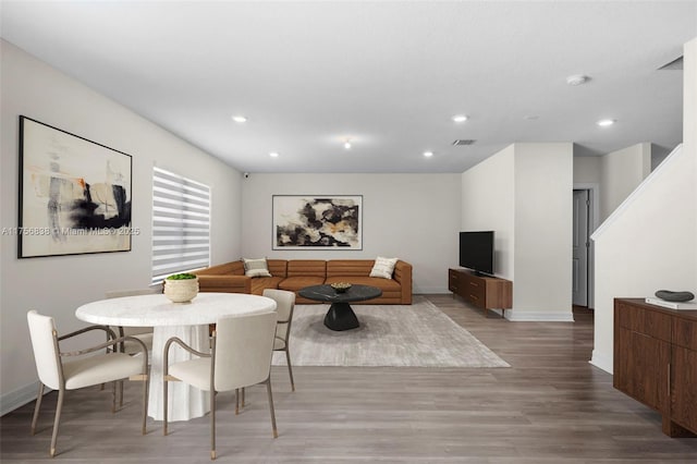 3142 Poinciana St, Lauderdale Lakes, FL 33311 - dining room featuring baseboards, recessed lighting, visible vents, and wood finished floors
