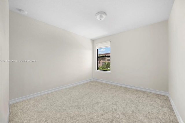 3142 Poinciana St, Lauderdale Lakes, FL 33311 - unfurnished room featuring carpet floors and baseboards