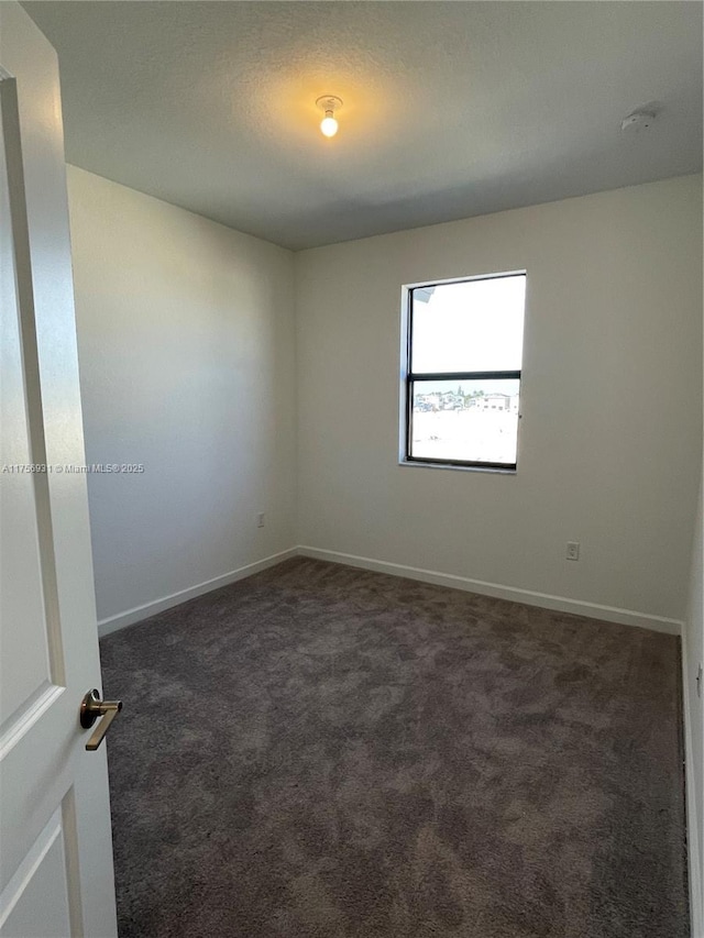 13384 SW 287th St, Homestead, FL 33033 - carpeted spare room with baseboards