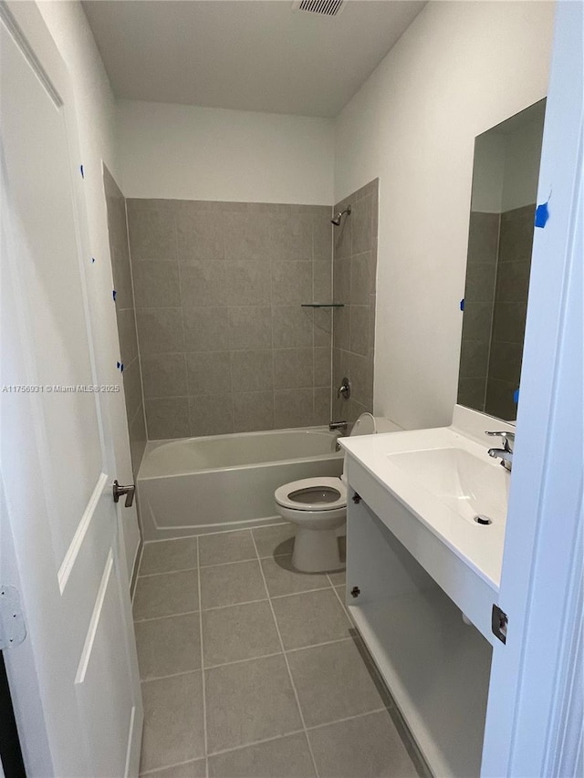 13384 SW 287th St, Homestead, FL 33033 - bathroom featuring visible vents, toilet, vanity,  shower combination, and tile patterned floors