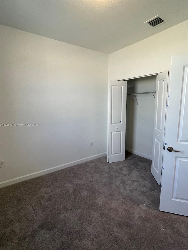 13384 SW 287th St, Homestead, FL 33033 - unfurnished bedroom with carpet floors, a closet, visible vents, and baseboards