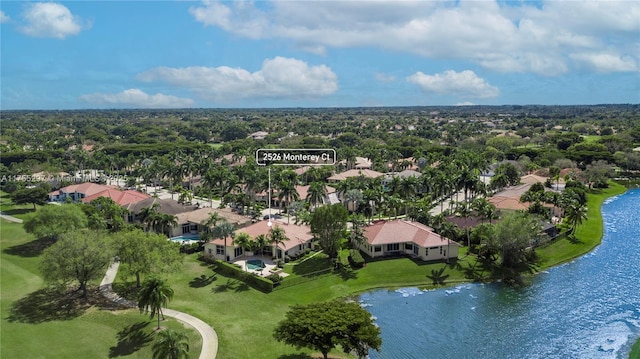 bird's eye view featuring a water view and a residential view