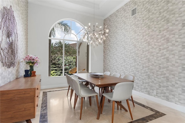 dining room featuring ornamental molding, visible vents, baseboards, and wallpapered walls