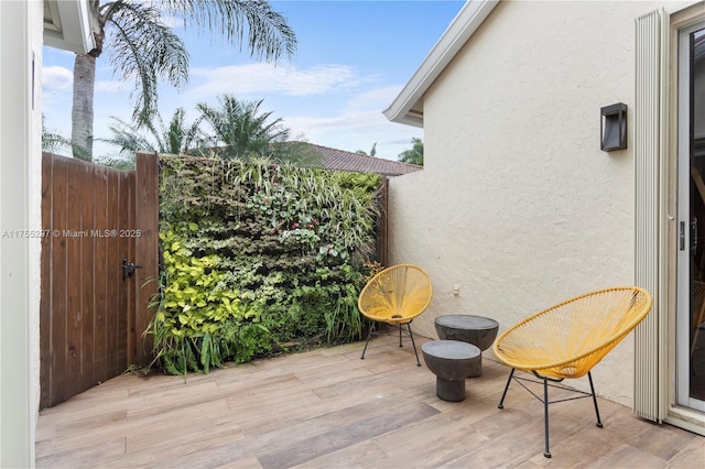 view of patio / terrace with fence