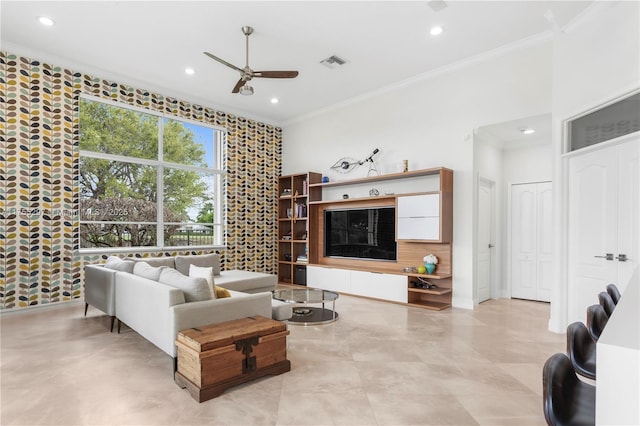 living area featuring ceiling fan, visible vents, crown molding, and recessed lighting