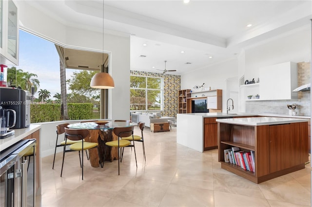 kitchen featuring modern cabinets, beverage cooler, and open shelves