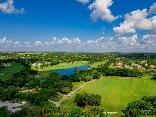 drone / aerial view featuring a water view and golf course view